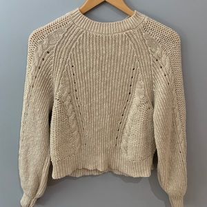 I am selling a light beige sweater